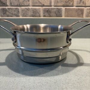 Stainless steel steamer insert or double boiler insert.